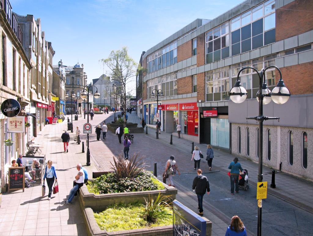 Lot: 77 - PORTFOLIO OF HIGH STREET COMMMERCIAL PREMISES (PART LET) - View of High Street Falkirk including Santander